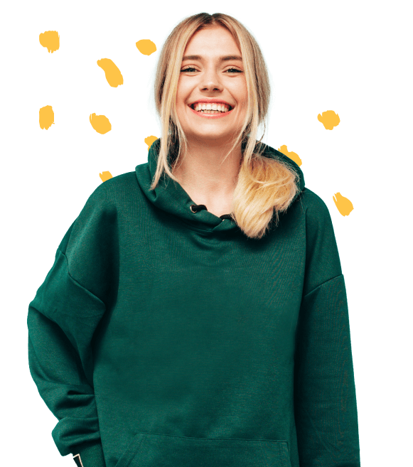 Abijith, the blonde, dressed in a green hoodie with a smile on her face